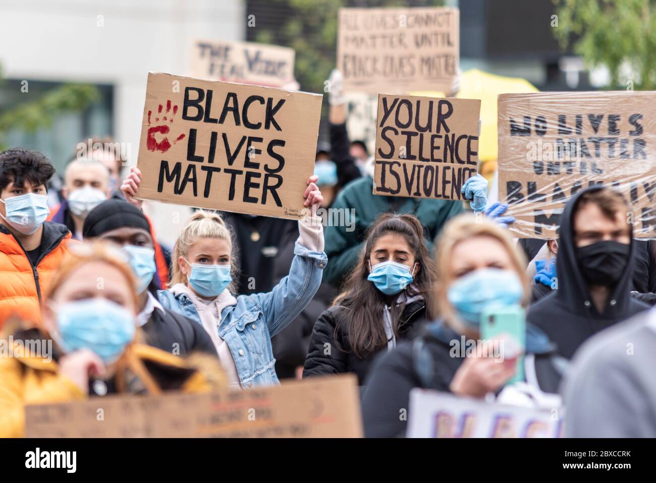 Black Lives Matter anti racism protest demonstration in Southend on Sea, Essex, UK. Crowd with placards. Your silence is violence. White, Caucasian Stock Photo