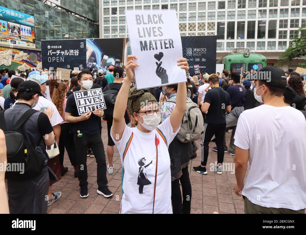 Tokyo, Japan. 6th June, 2020. Protestors raising cards hold a rally against racism and violence by police in Tokyo's Shibuya district on Saturday, June 6, 2020. Some hundreds of people gather for Black Lives Matter as black man George Floyd killed by police in Minneapolis and police's violence to Kurdish man in Shibuya. Credit: Yoshio Tsunoda/AFLO/Alamy Live News Stock Photo