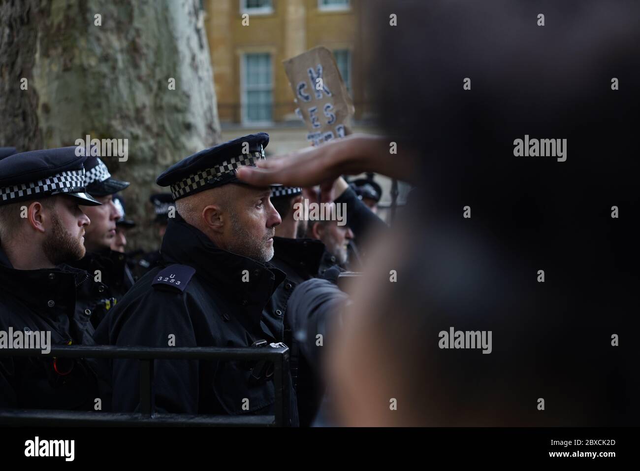 London, England. 6 June 2020.Protestors and police clash during a BLM protest which took place today in Trafalgar Square, Parliament Square, Whitehall, and outside Downing Street. The protest began peacefully, but escalated into violence as TSG mounted units joined the scenes. Credit: David Babaian/Alamy Live News Stock Photo