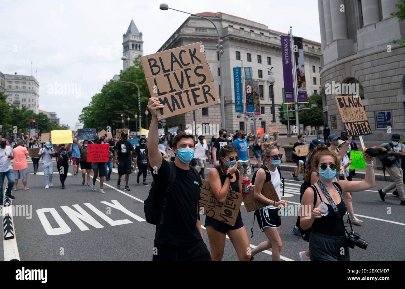 Washington, USA. 6th June, 2020. Protesters march near the Capitol Hill during a demonstration over the death of George Floyd in Washington, DC, the United States, on June 6, 2020. Chanting slogans while holding signs, thousands of protesters marched to Washington, DC on Saturday, staging what is expected to be the largest demonstration in the nation's capital against racial injustice and police brutality. Credit: Liu Jie/Xinhua/Alamy Live News Stock Photo