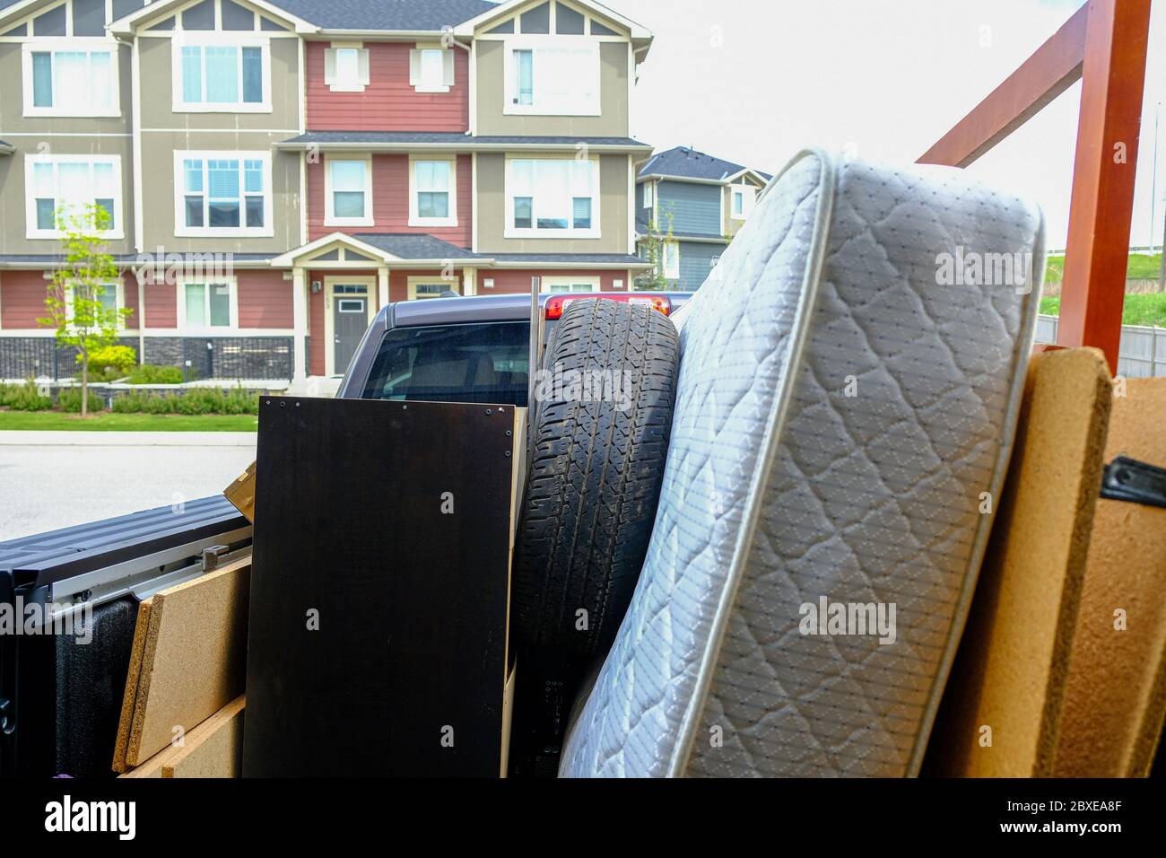 Trash items loaded on a truck to be disposed of at a landfill Stock