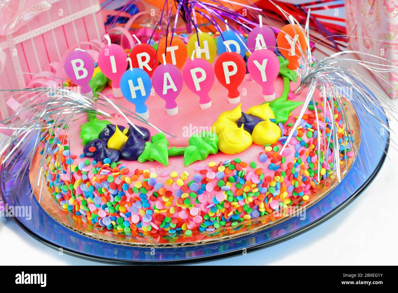 Beautiful And Colorful Happy Birthday Cake Surrounded With Gifts And Festively Decorated Candles Say Happy Birthday Stock Photo Alamy Beautiful And Colorful Happy Birthday Cake Surrounded With Gifts And Festively Decorated Candles Say Happy Birthday Stock Photo Alamy