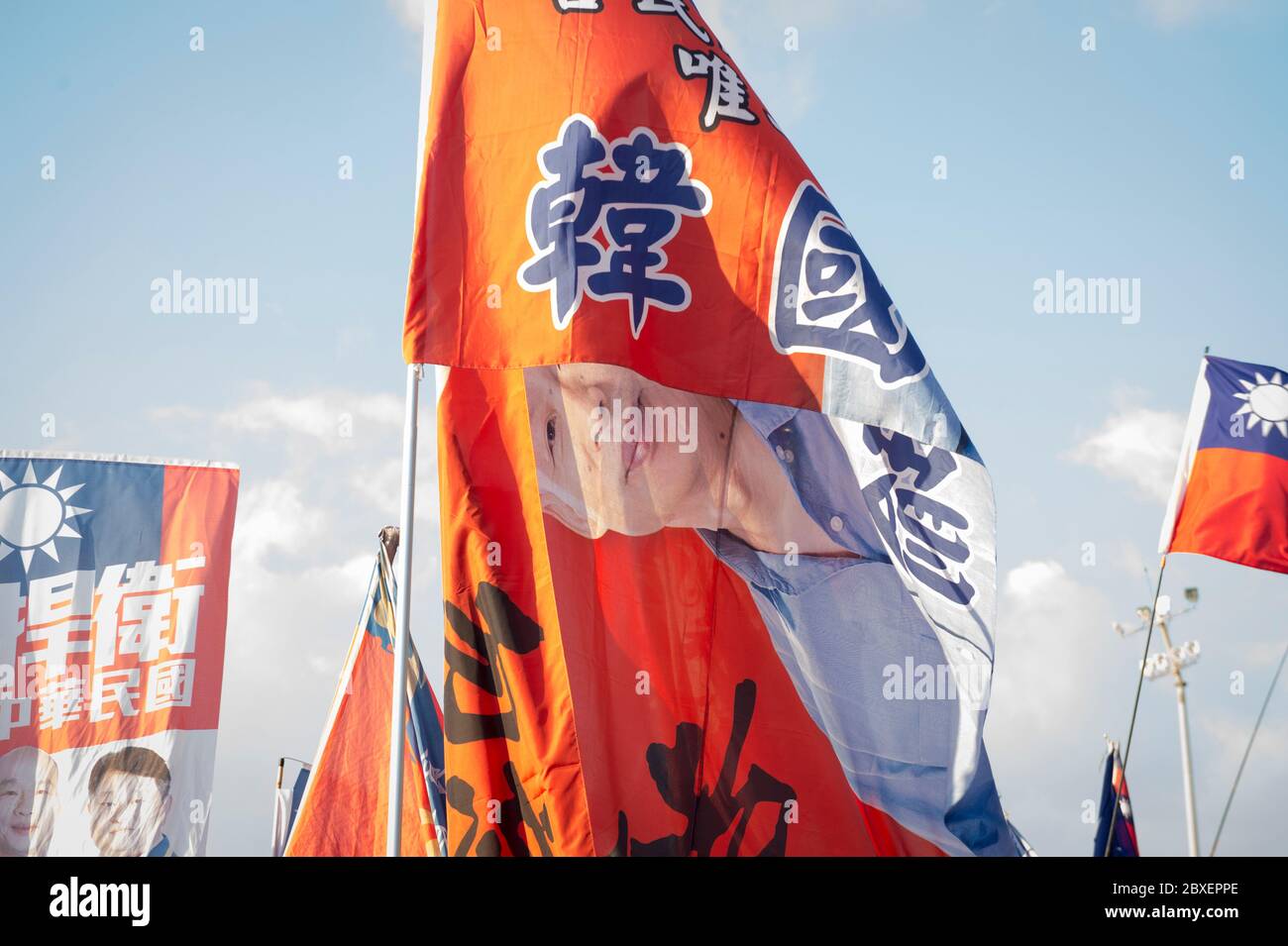 Taiwan. 8th Dec, 2019. A flag with the image of Han Kuo-yu, the presidential candidate of Taiwan's main opposition Kuomintang party (KMT), raised up during a campaign rally. Credit: Lin Yen Ting/SOPA Images/ZUMA Wire/Alamy Live News Stock Photo