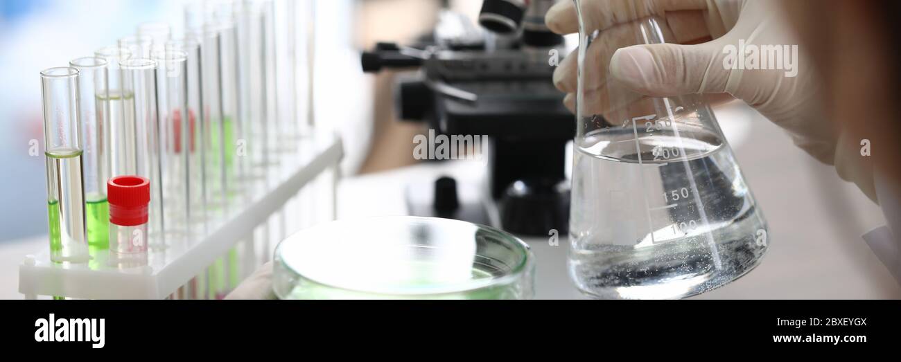 Chemical experience in laboratory, water sample. Stock Photo