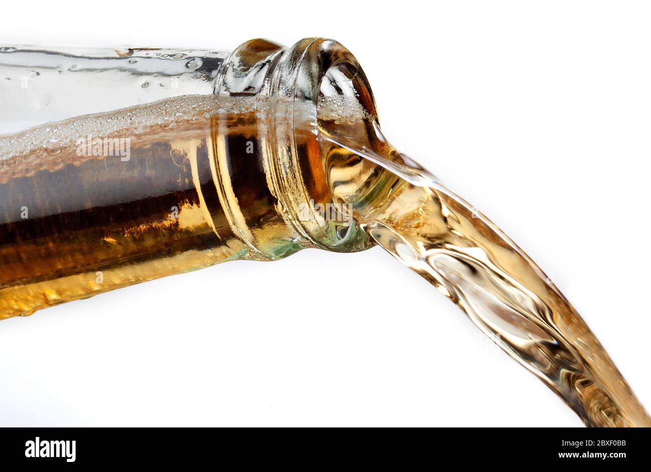 Pouring ice cool beer from a bottle Stock Photo Alamy