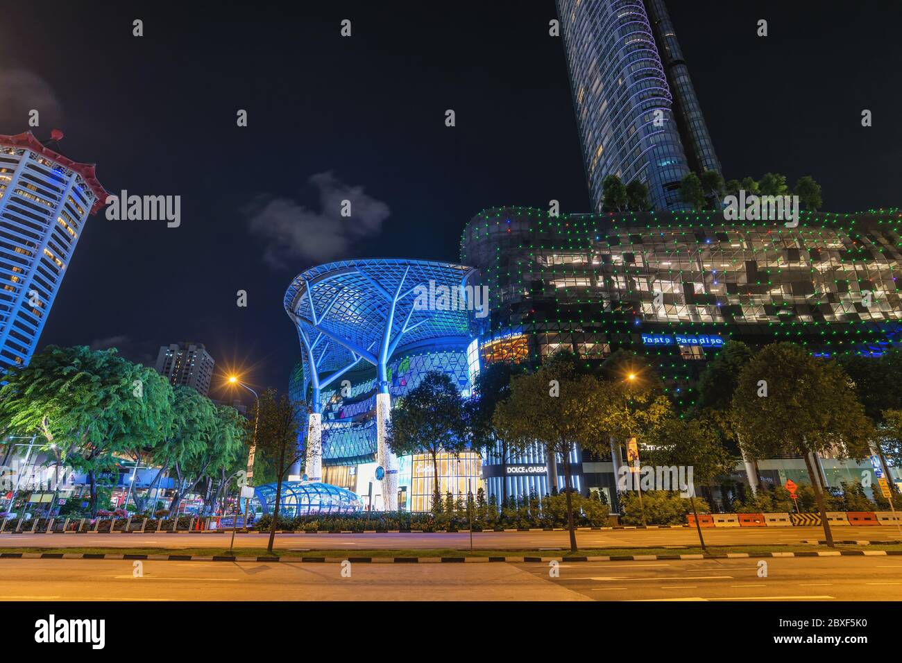 Orchard Road, Singapore -  July 15, 2019 : Singapore night city skyline at ION Orchard shopping mall Stock Photo