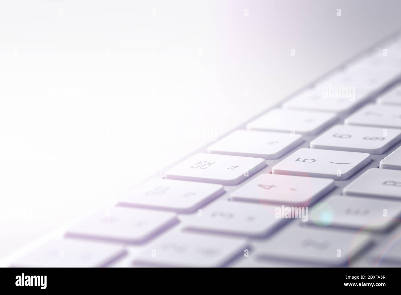 computer keyboard close up, detail of keys with light effect background Stock Photo