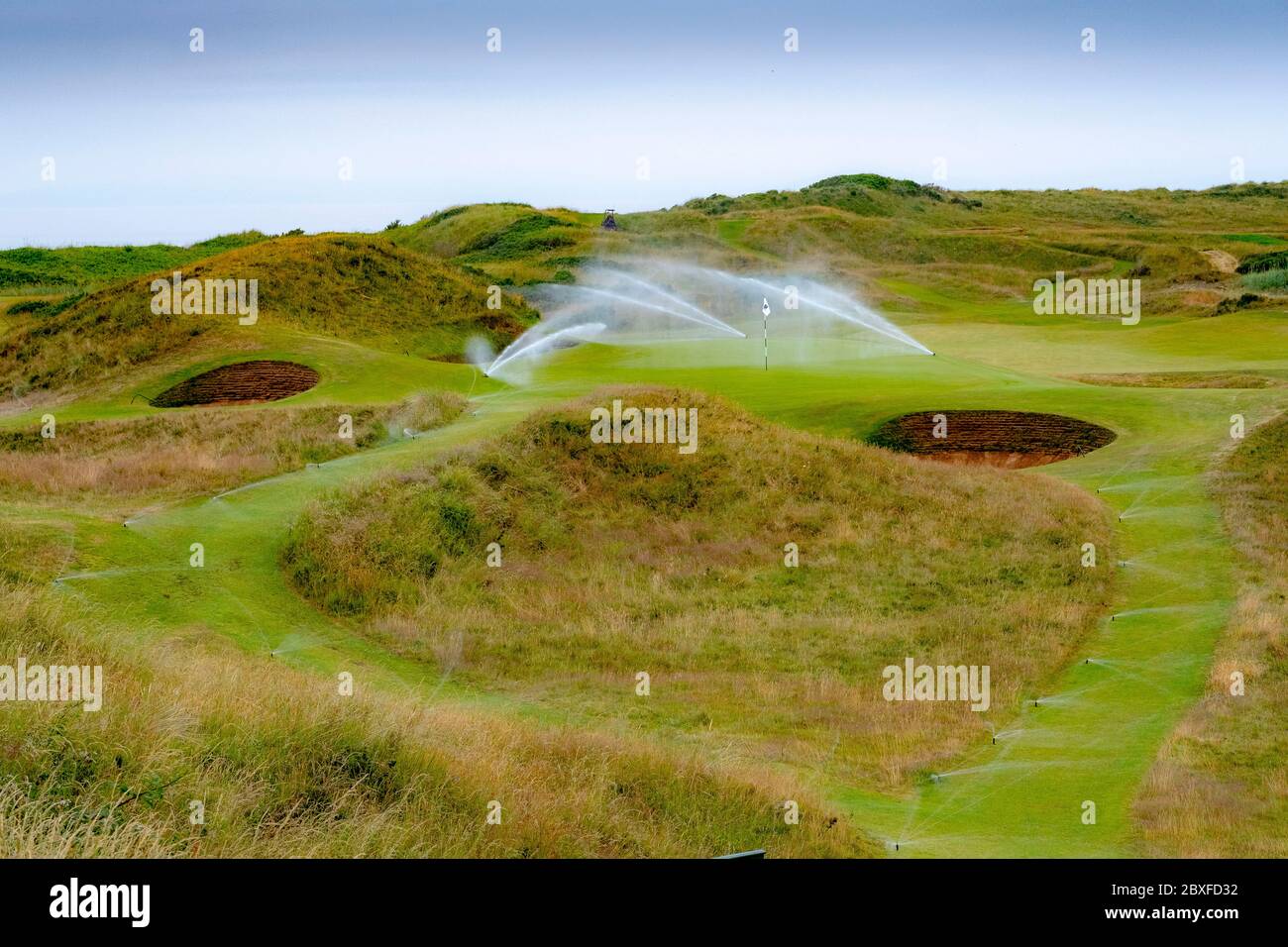 Irrigation system on golf course Stock Photo Alamy