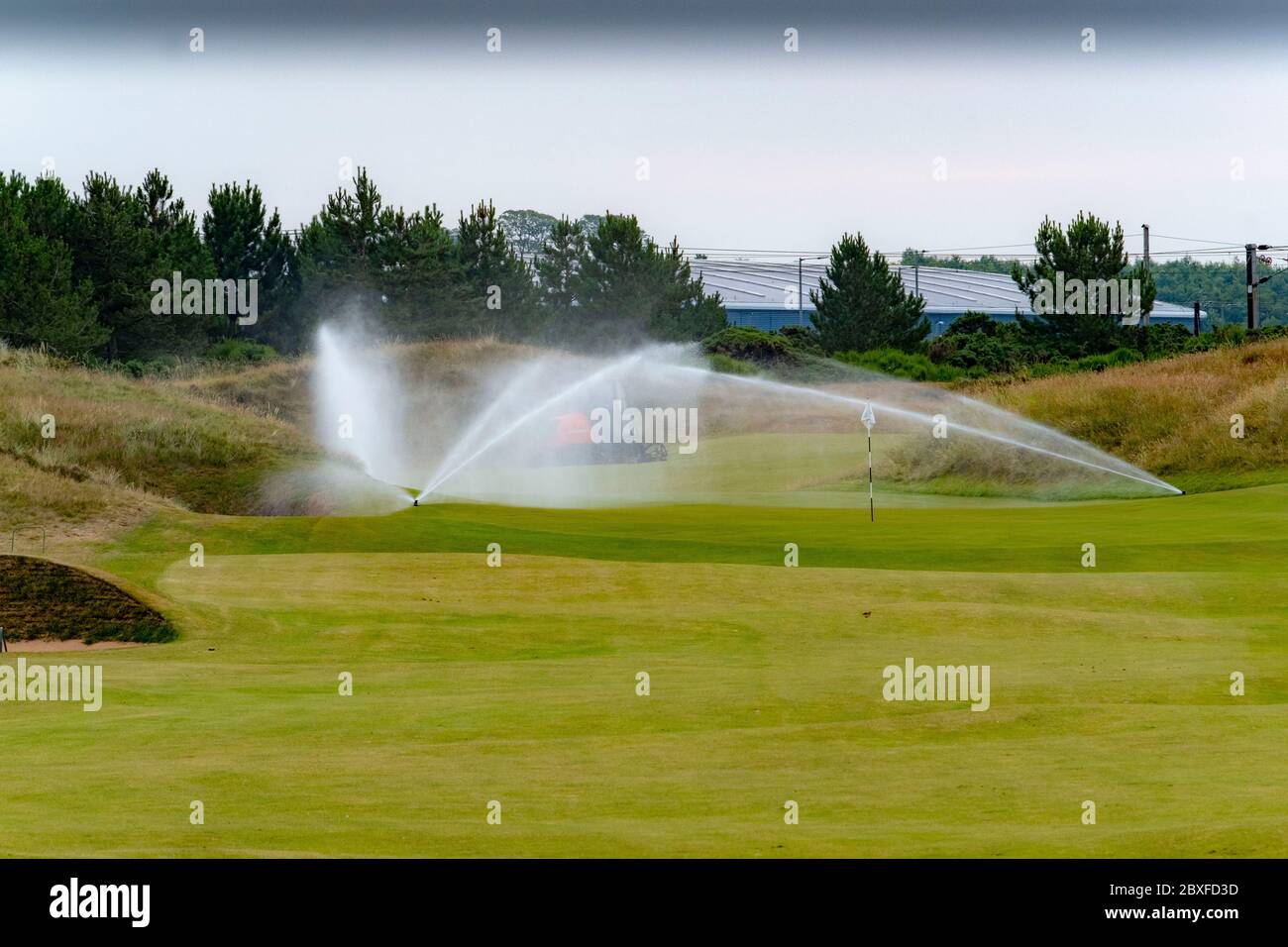 Irrigation system on golf course Stock Photo Alamy