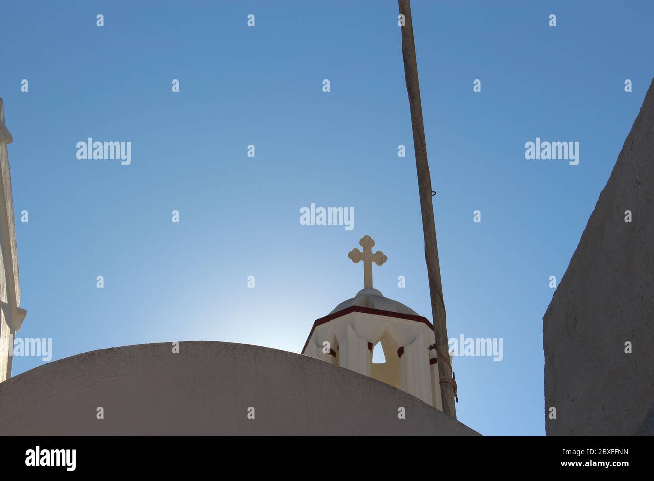Santorini church cross Stock Photo