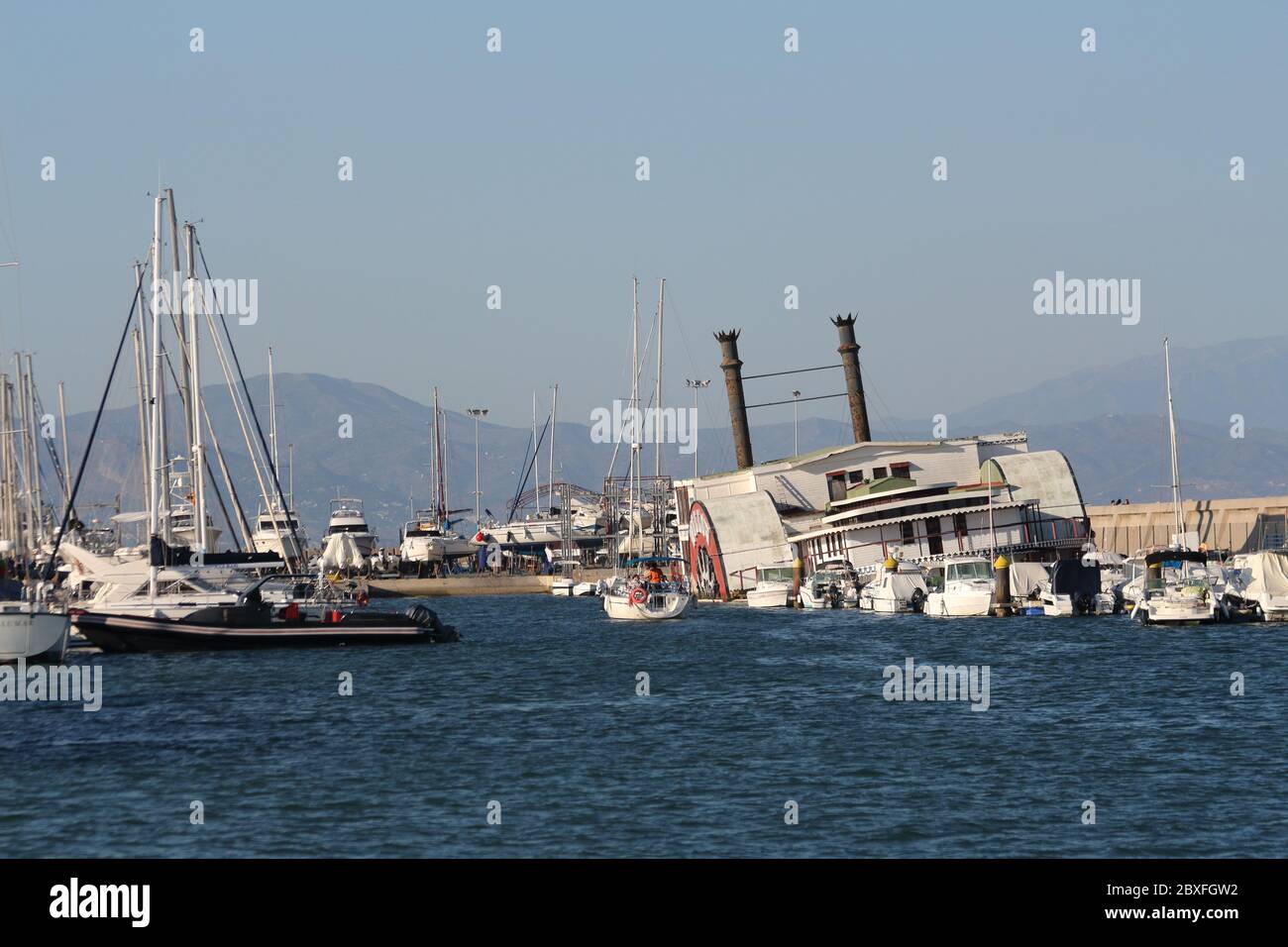 The Mississippi Steam Boat "Willow" half sunken, tied up at the Marina