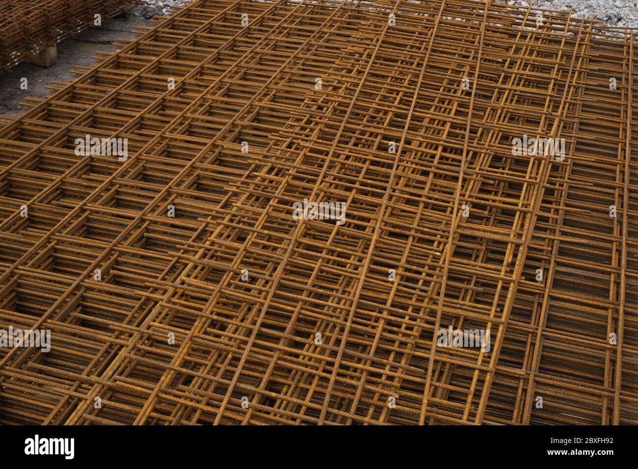 Steel reinforcing mesh ready for use on a building site. Stock Photo