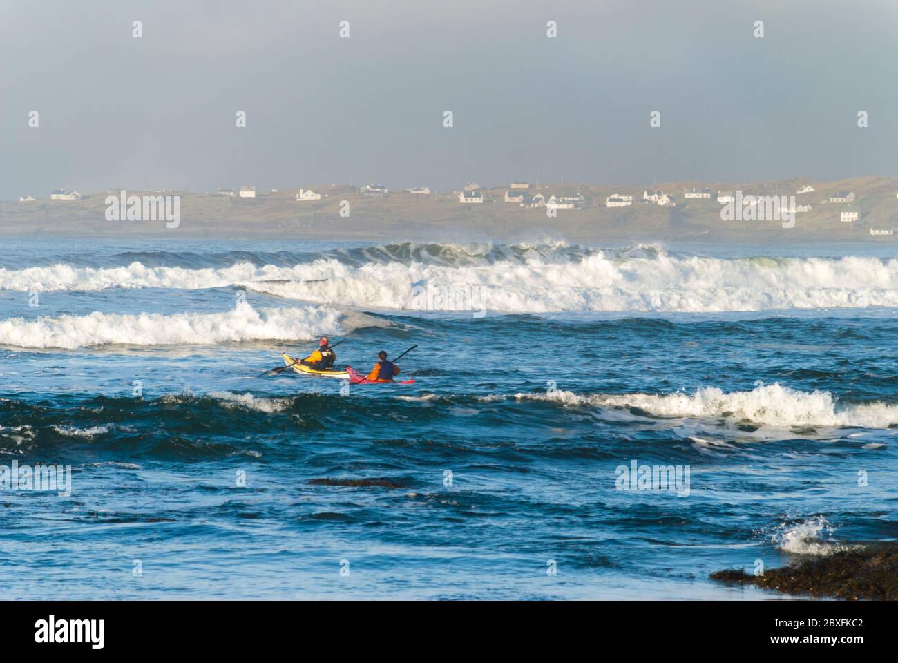 Kayakers near Ardara, County Donegal, Ireland, on the Wild Atlantic Way in rough weather. Stock Photo