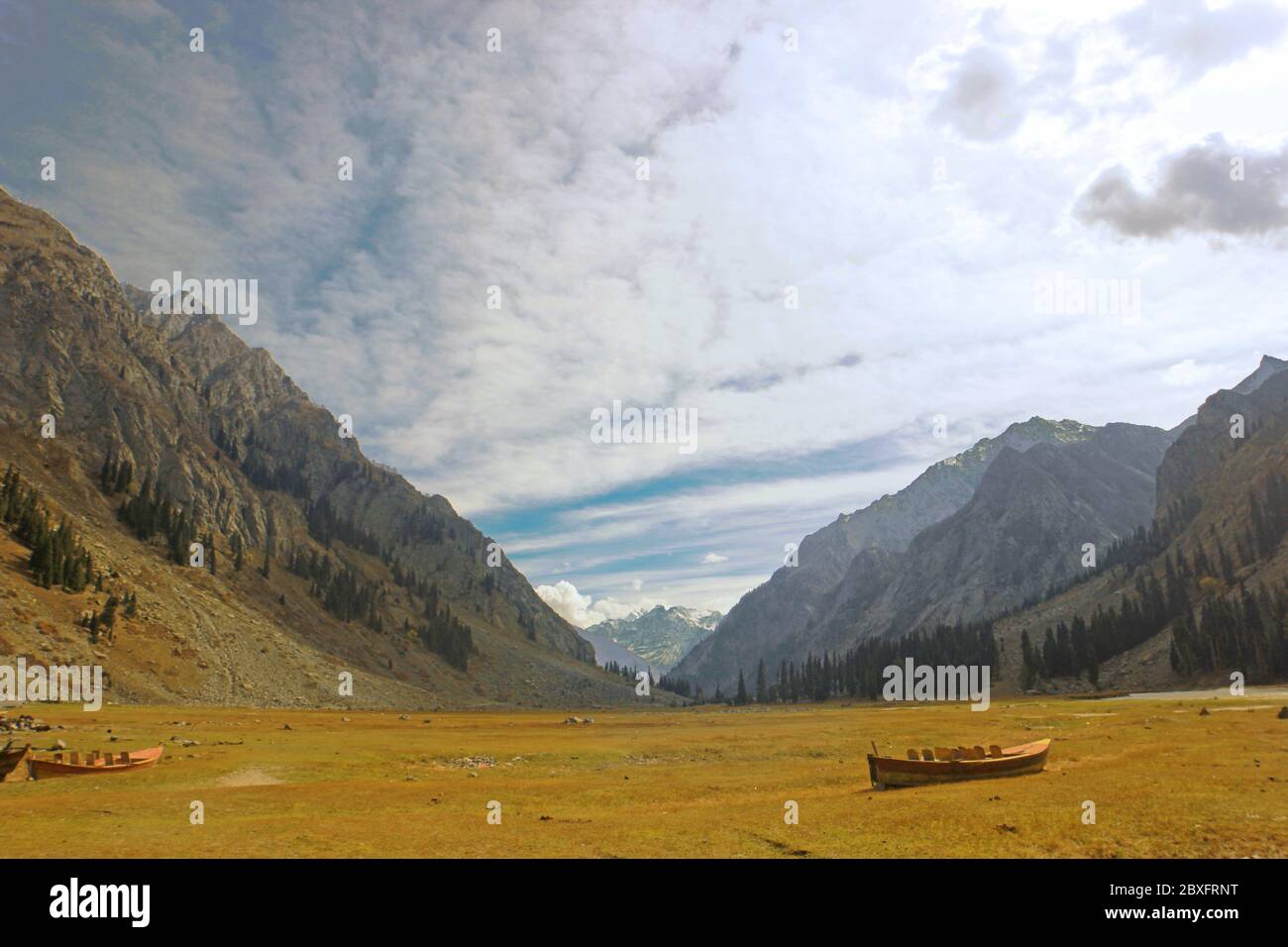Beautiful Landscape in the mountains with blue skys, boat in swat valley kpk Pakistan Stock Photo