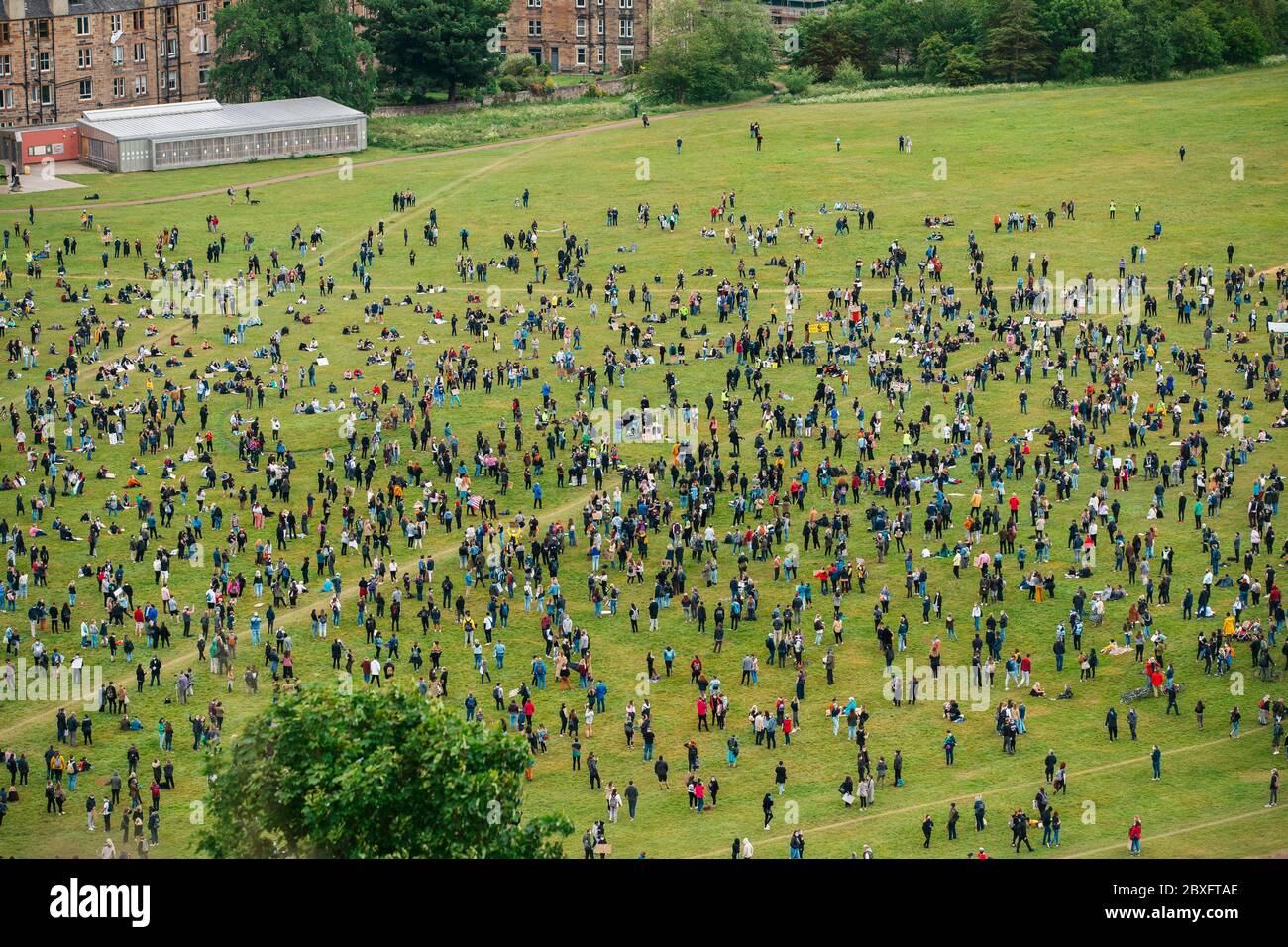 Edinburgh, Scotland. 7th June 2020. Black Lives Matter supporters hold a socially distanced rally in Holyrood Park. Credit: Andrew Perry/Alamy Live News Stock Photo