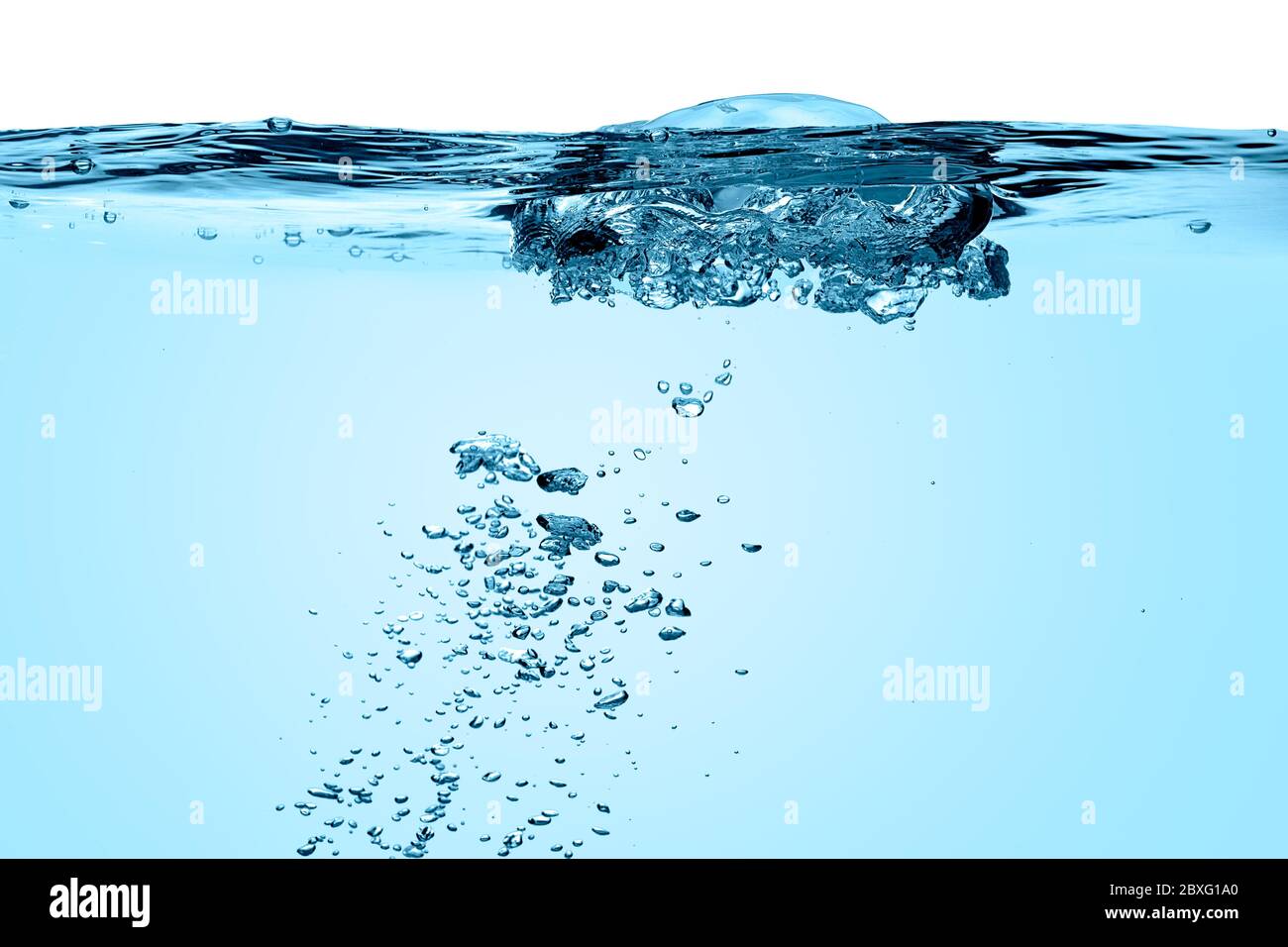 Bubbling air bubbles in water glass hires stock photography and images