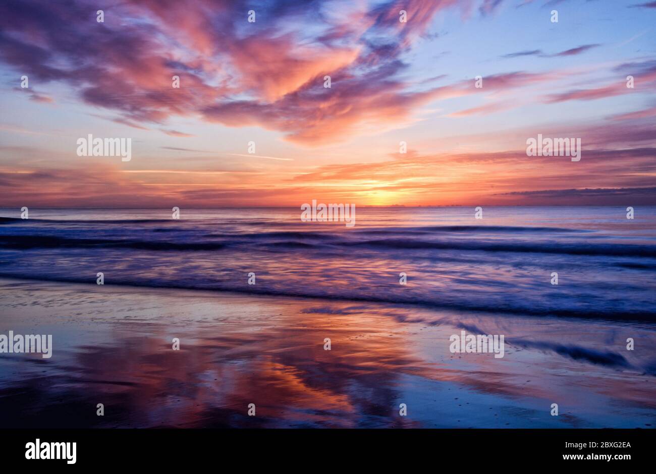 Long camera exposure captures the beauty of sunrise in Myrtle Beach
