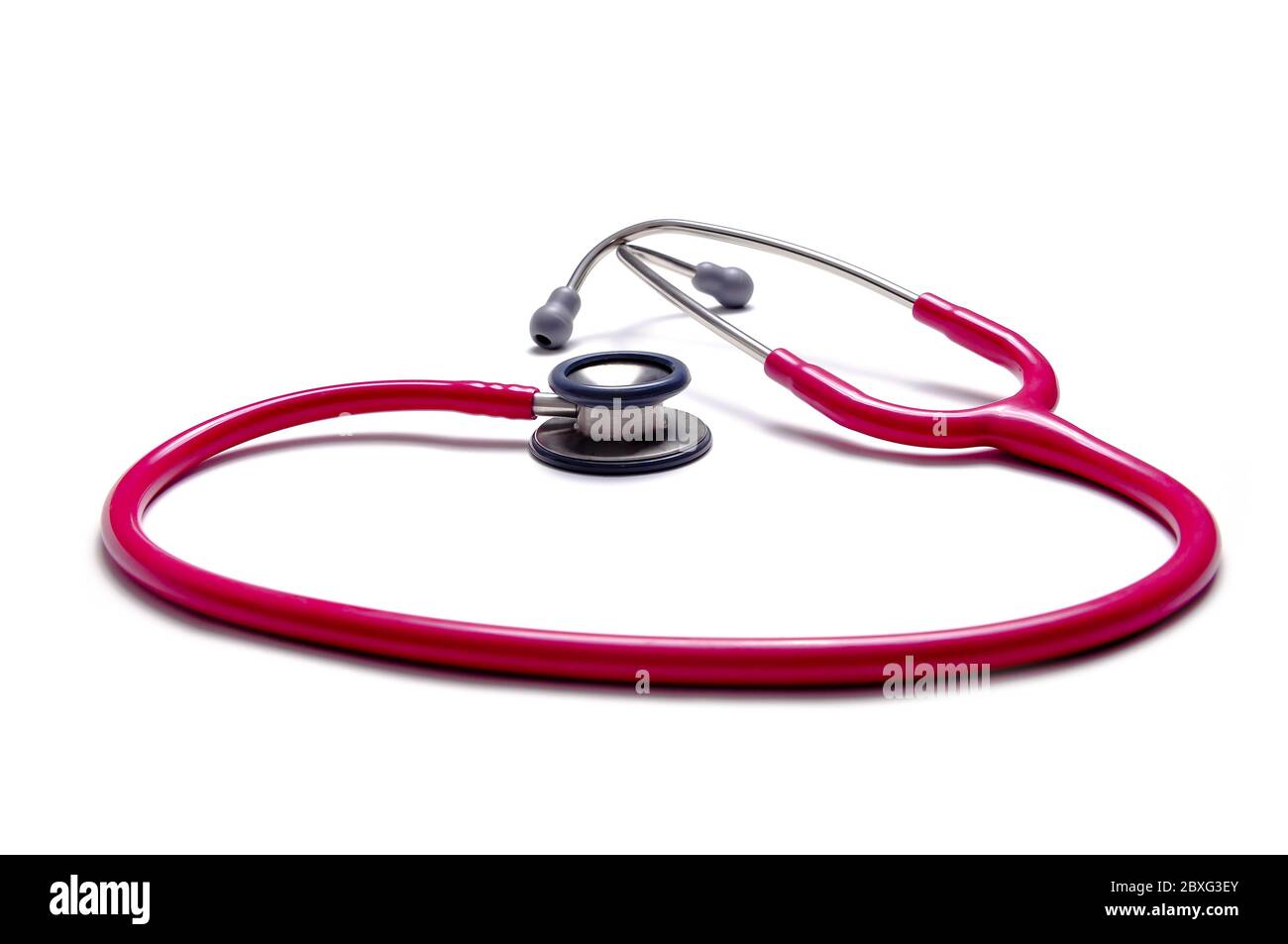 Pink colour stethoscopes isolated on white background Stock Photo - Alamy