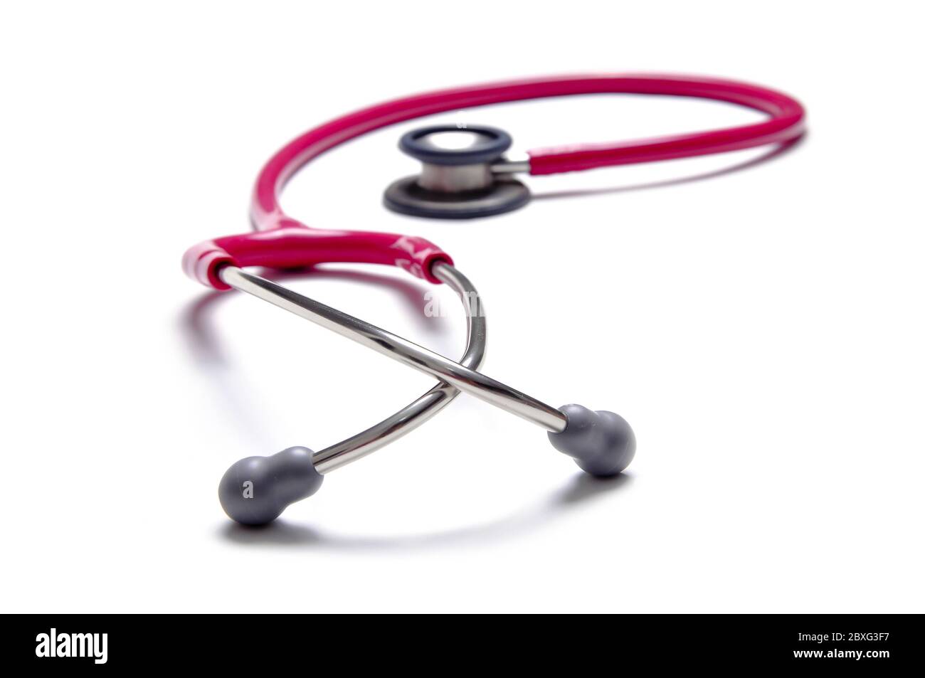 Pink colour stethoscopes isolated on white background Stock Photo Alamy