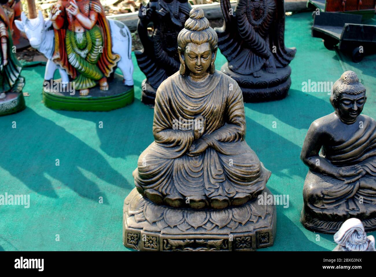 antique buddha god clay Sculpture Made with Earthen Mud, handcrafted traditional clay decoration in indian market Stock Photo