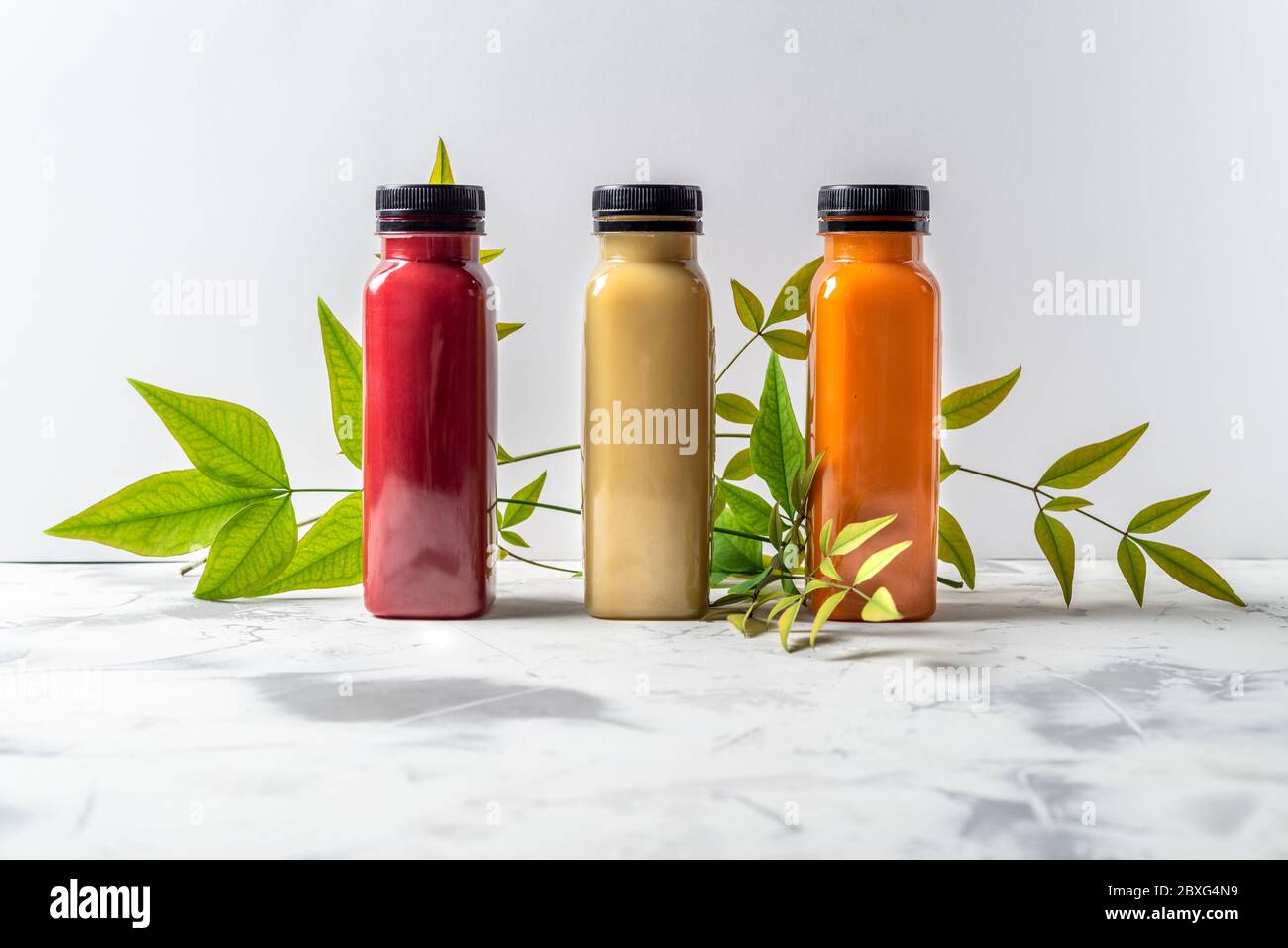 Download Red Yellow Smoothies In Bottles High Resolution Stock Photography And Images Alamy PSD Mockup Templates