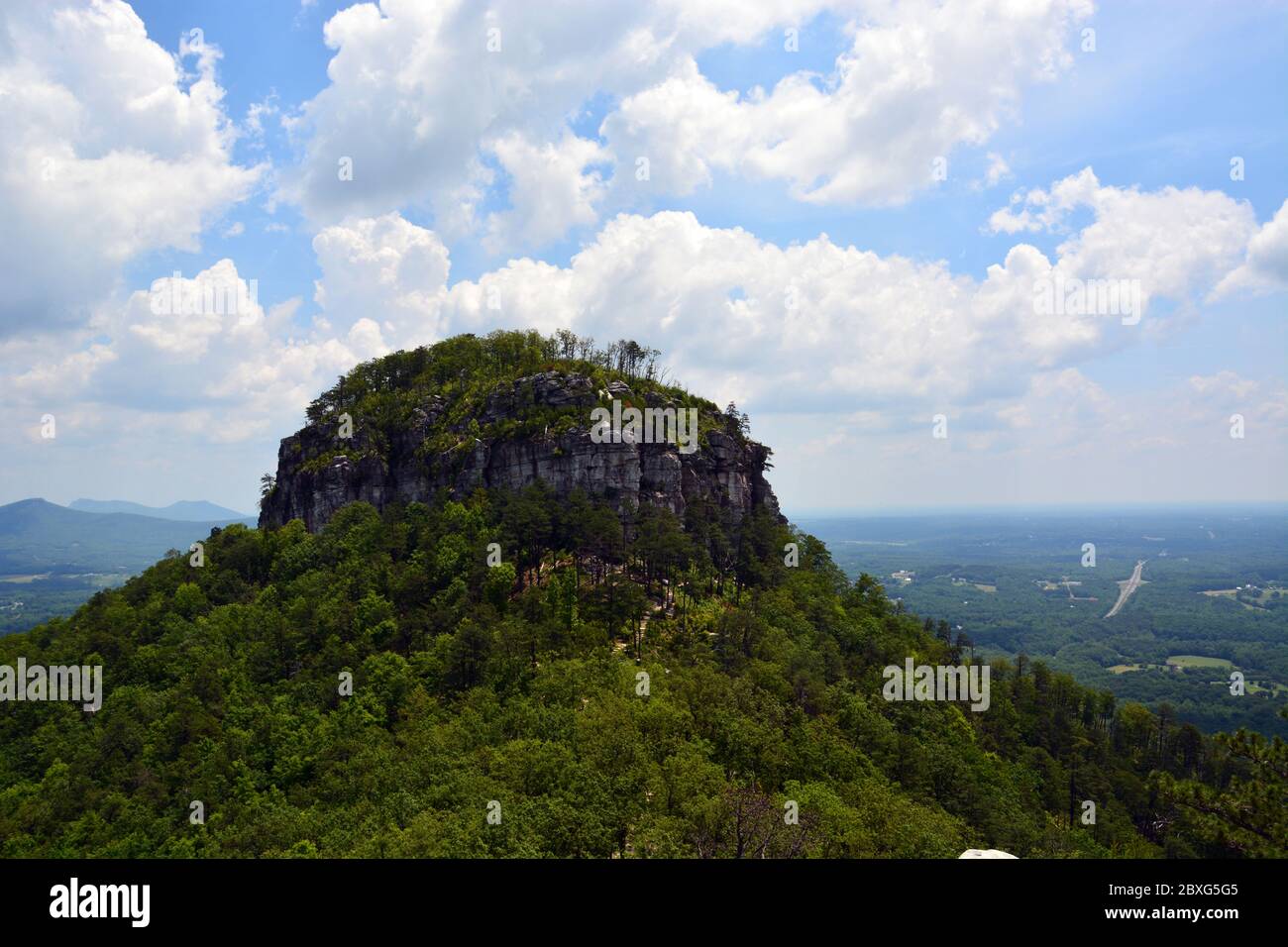Pilot Mountain's signature pinnacle rises above the Yadkin Valley and