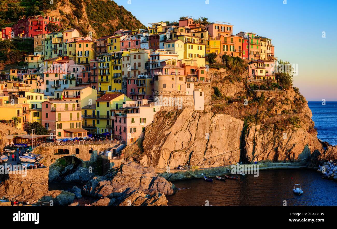 Manarola village in Cinque Terre, on Mediterranean coast of Liguria, Italy, in sunset light Stock Photo