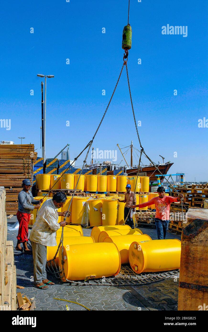 loading and unloading of goods in the traditional port of Dubai Stock Photo