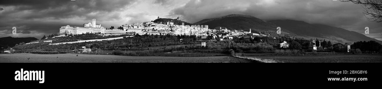 Panorama of the walled town of Assisi, Italy as seen from below Stock Photo