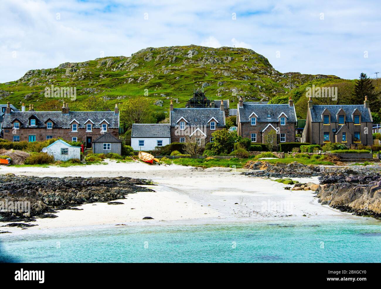Houses by the beach, Iona, Inner Hebrides, Scotland, UK Stock Photo