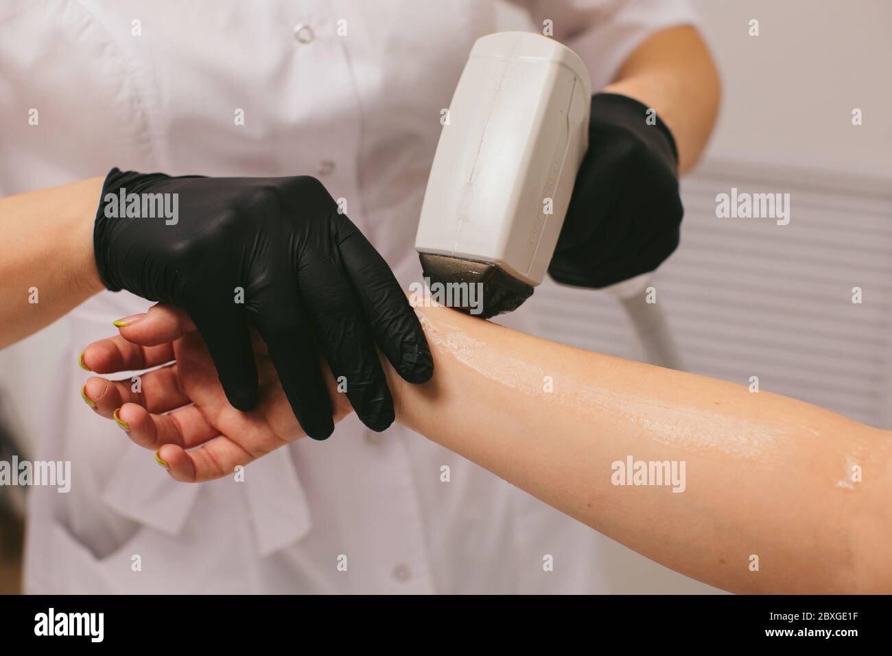 Woman having a Laser hair removal treatment in a beauty salon Stock Photo
