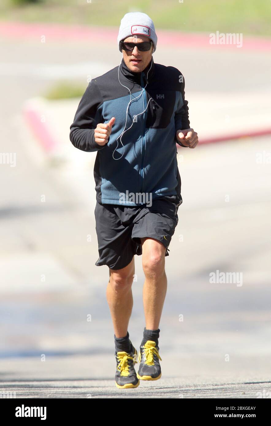 Matthew McConaughey spends the morning exercising in Zuma Beach, California. March 2011 Stock Photo