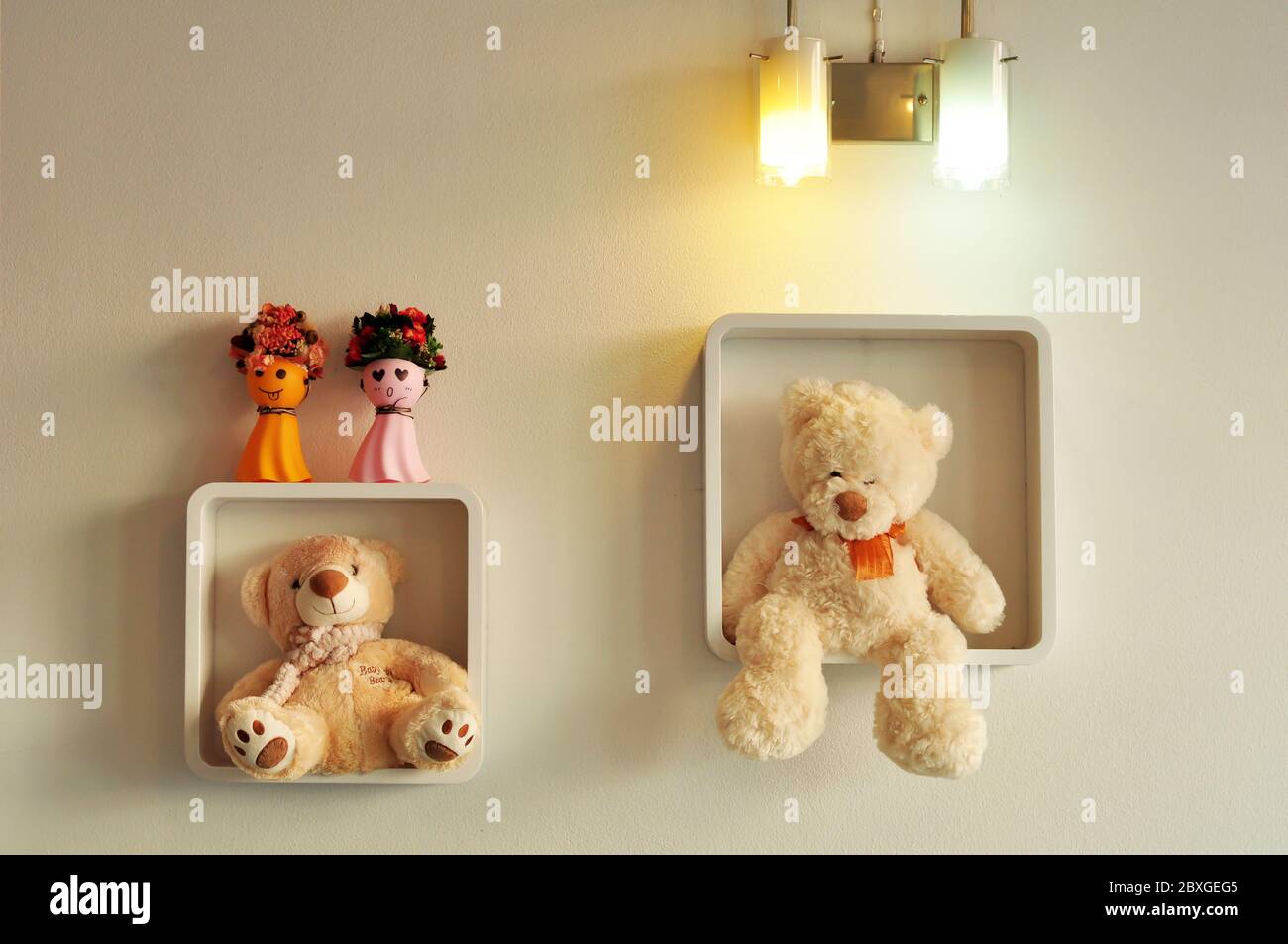 Teddy bear on shelves in the living room Stock Photo - Alamy