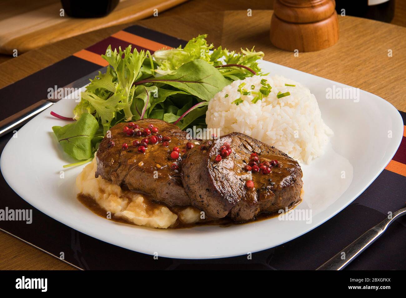 Steak, rice,  salad and mashed potato Stock Photo