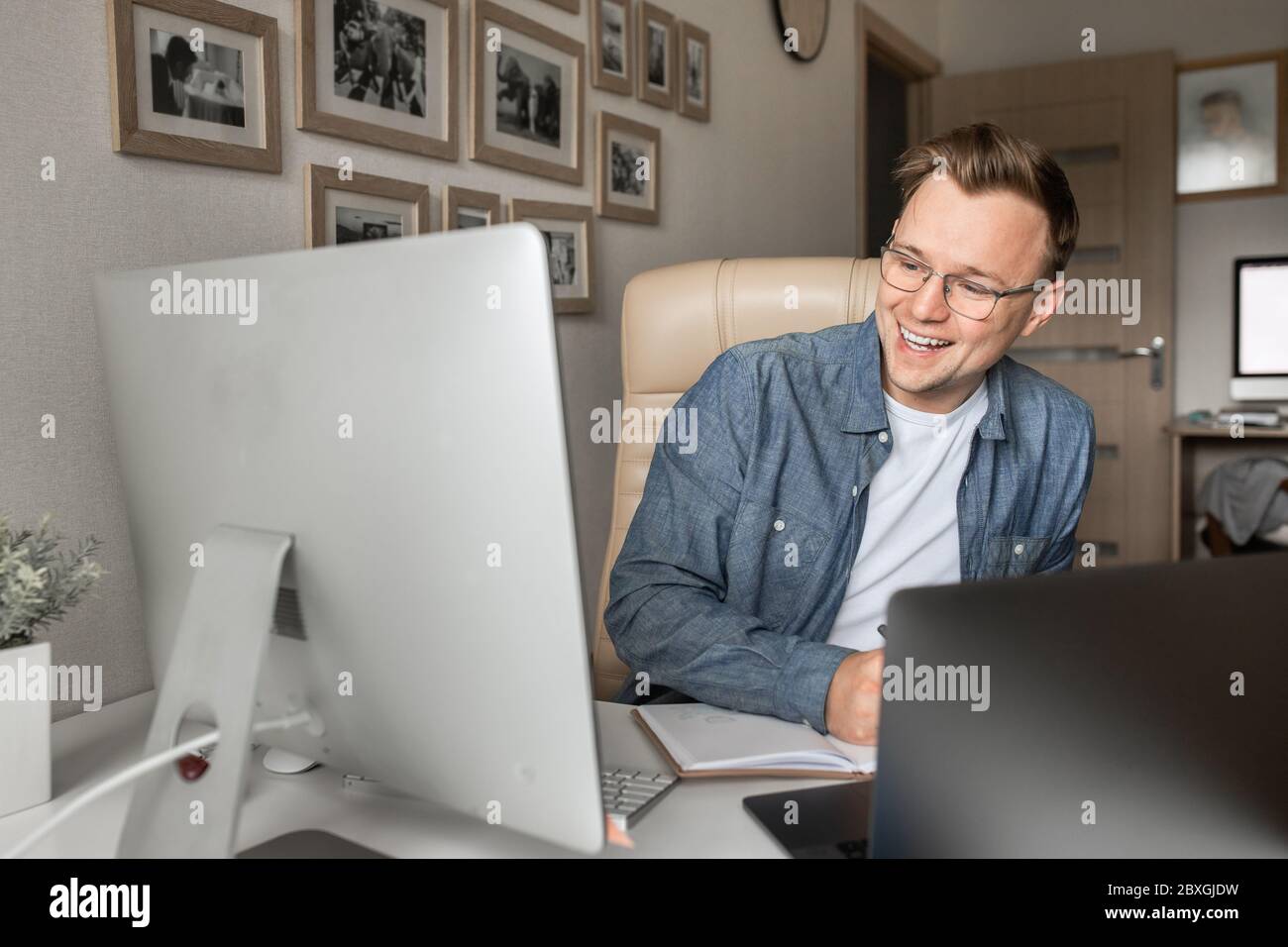 Business man using video call on laptop discuss work project online. Stock Photo