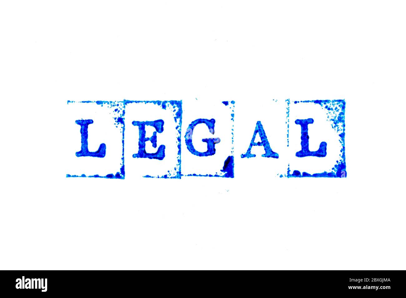 Blue ink of rubber stamp in word legal on white paper background Stock