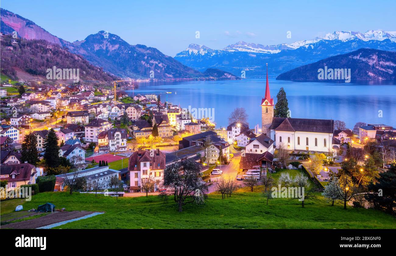 Weggis, a picturesque village on Lake Lucerne Switzerland, on late evening. Weggis is a popular tourist destination in the swiss Alps mountains. Stock Photo