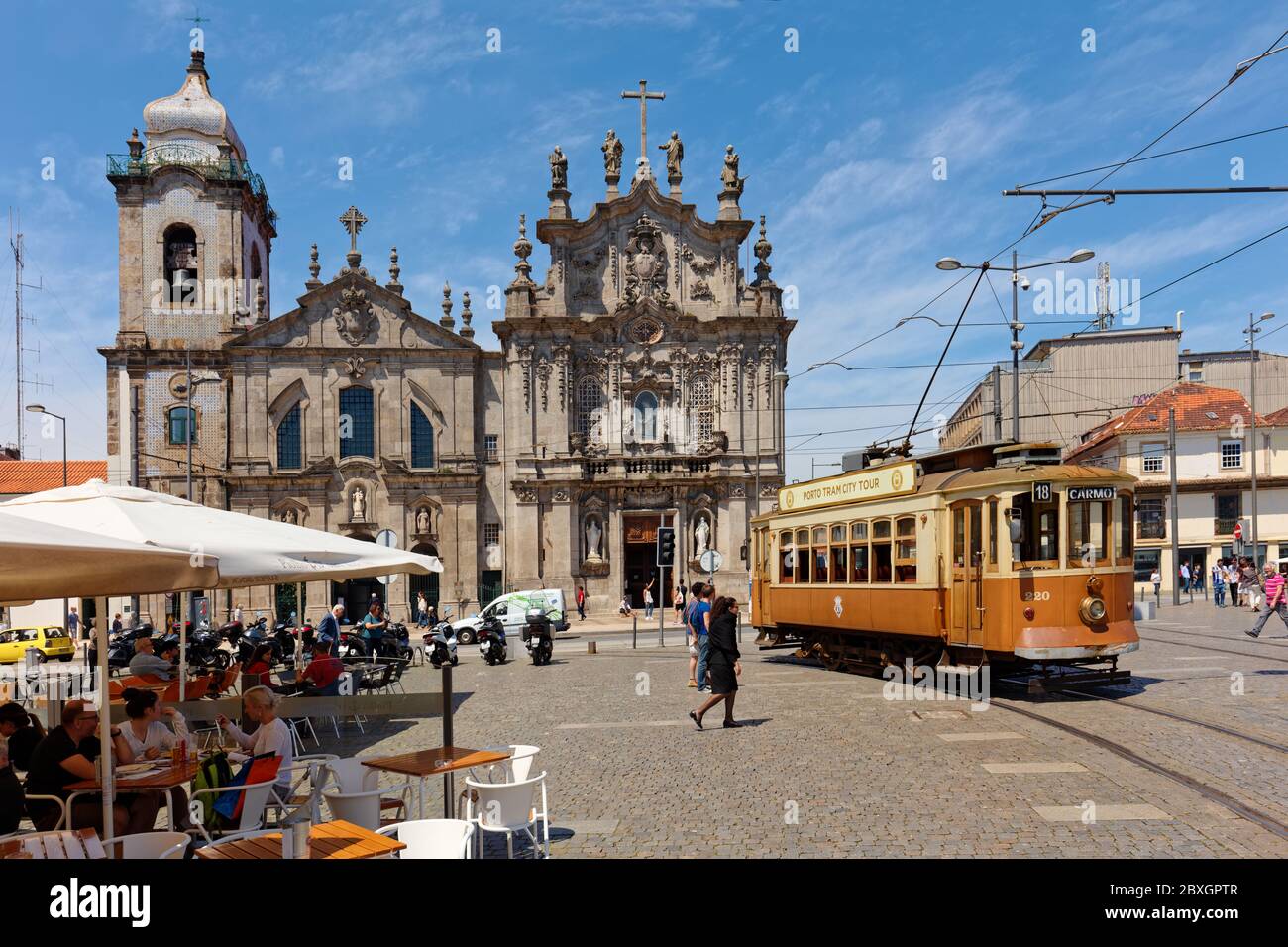 Porto, Portugal - May 8, 2017: People in heritage trams on the Carlos Alberto square. First trams in the city with electric traction was introduced in 1895 Stock Photo