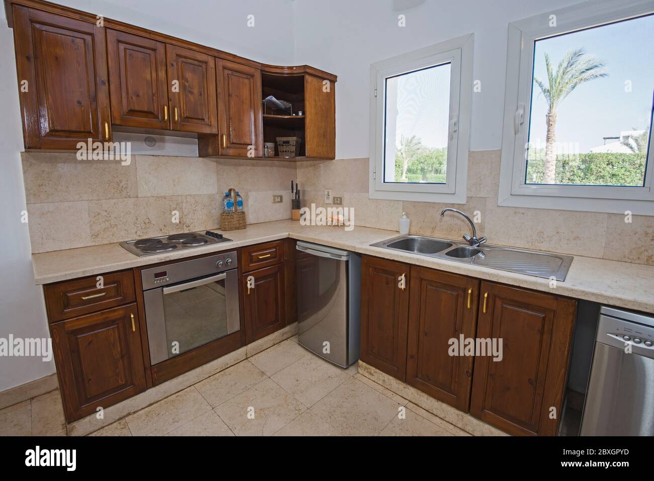 Image showcasing Kitchen in luxury villa show home showing interior design decor ...