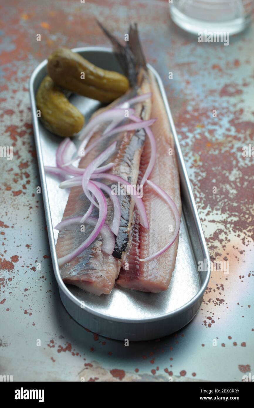 Dutch brined herring and pickles Stock Photo