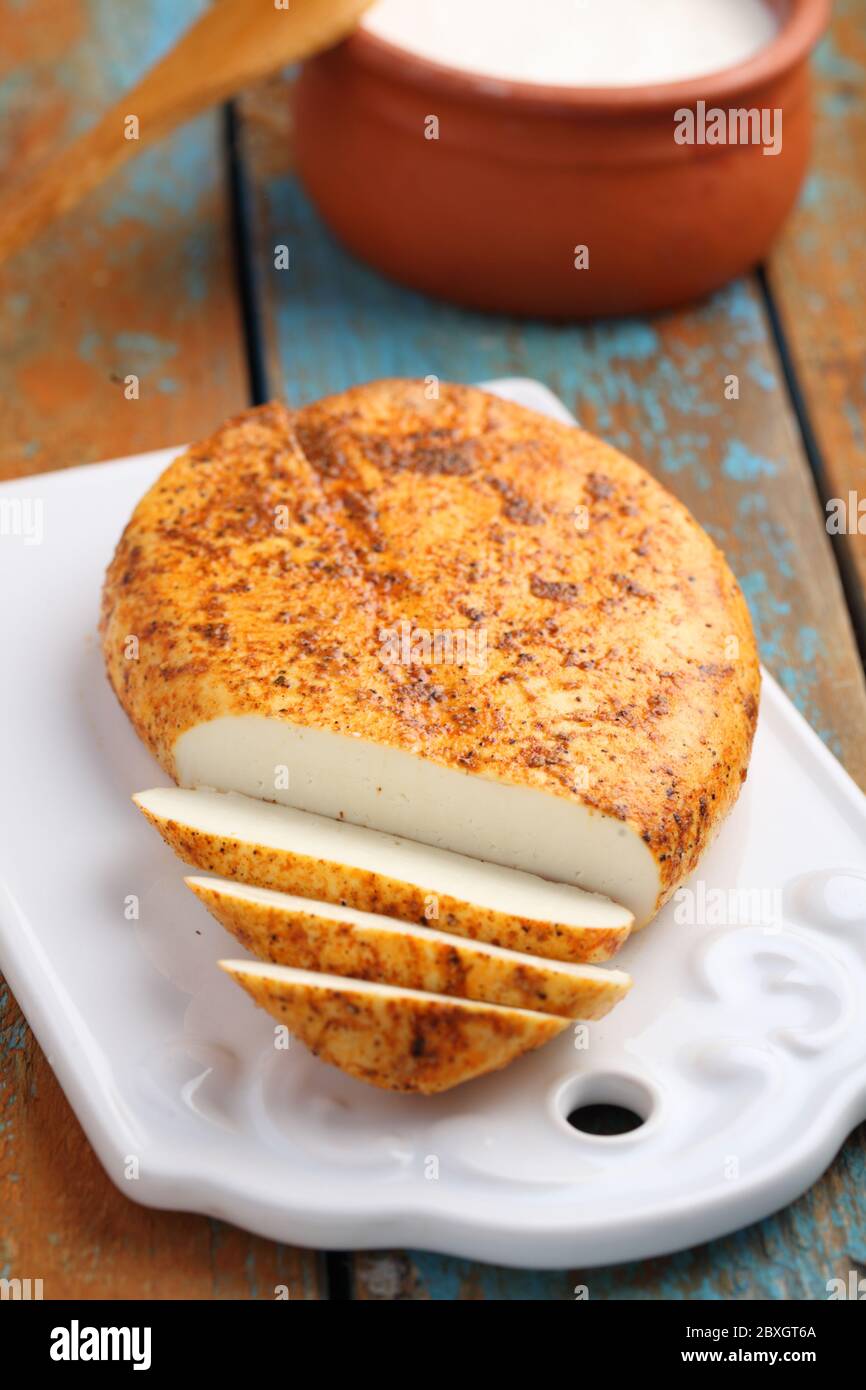 Lithuanian fried cheese on a rustic table Stock Photo