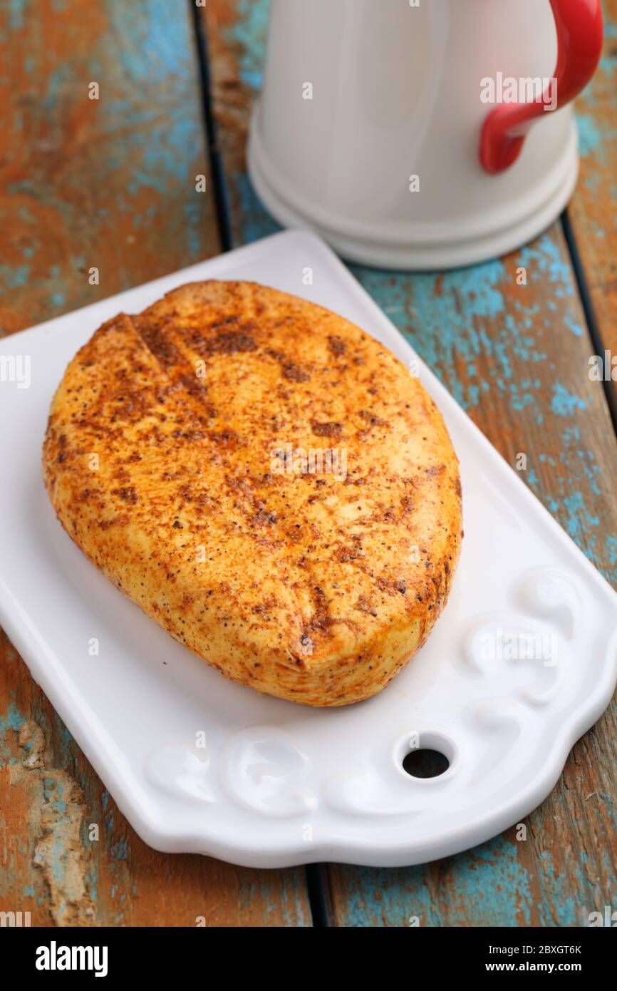 Lithuanian fried cheese on a rustic table Stock Photo