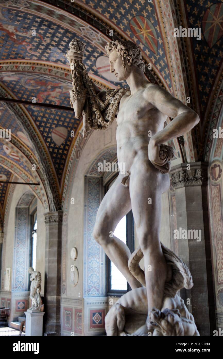 Florence, Italy - August 8, 2018: Sculpture in Palazzo del Bargello. Built in XIII century, this oldest public building in Florence was opened as a national museum in 1865 Stock Photo