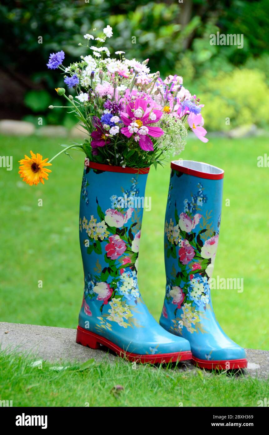 Boots with flowers hi-res stock photography and images - Alamy