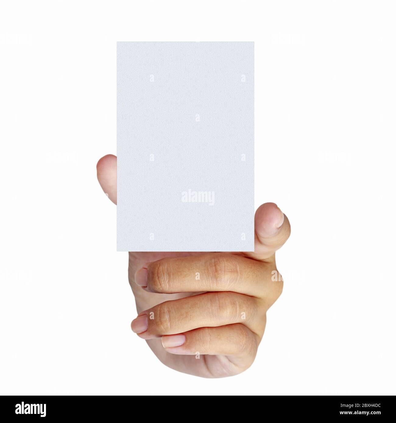 Caucasian hand holding up a blank white credit card Stock Photo