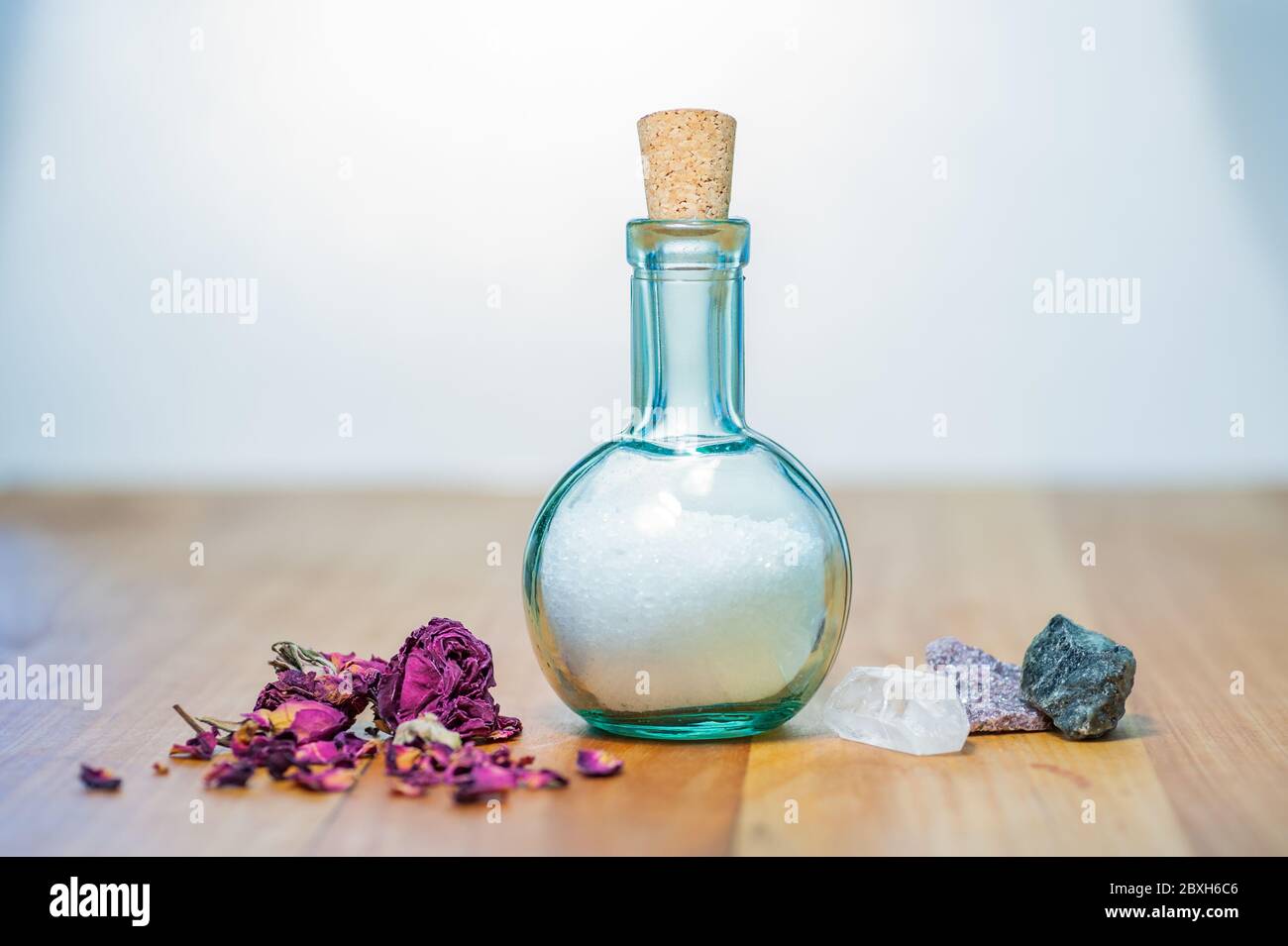 sea salt in recycled glass vile with cork lid Stock Photo