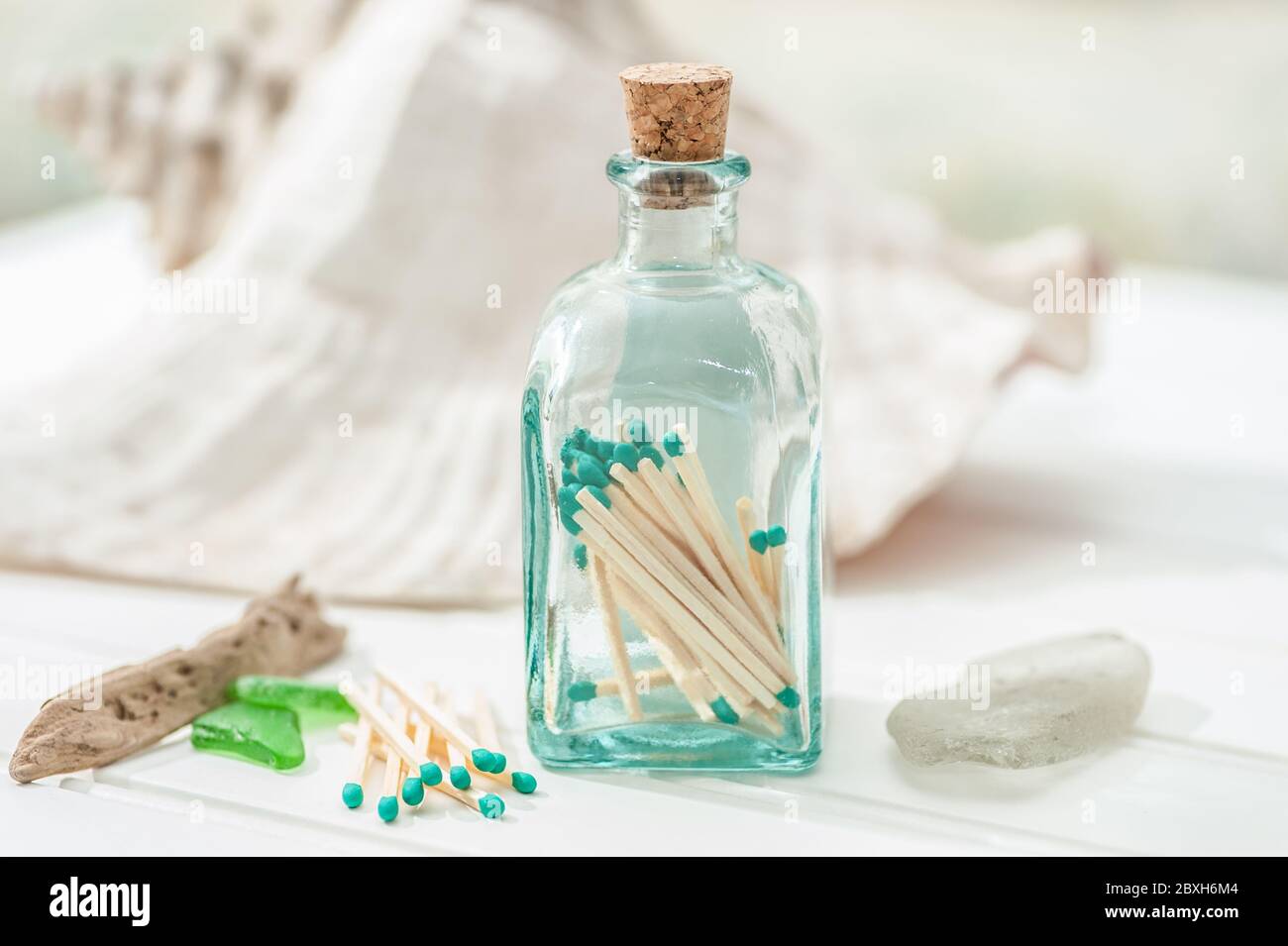 Matches inside recycled glass bottle with cork top Stock Photo Alamy