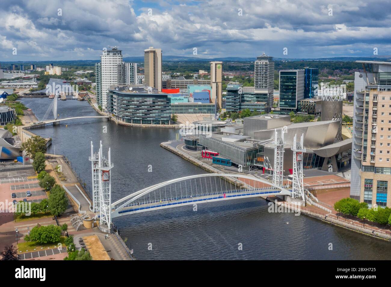 Manchester Salford Quays looking towards the BBC building and bridges. Modern offices near Manchester city centre Stock Photo