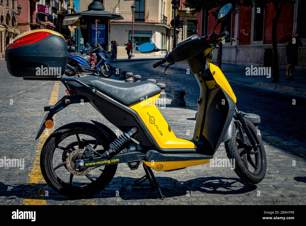 Seville, Spain; June 7, 2020: Electric motorbike rental in Plaza San Francisco Stock Photo