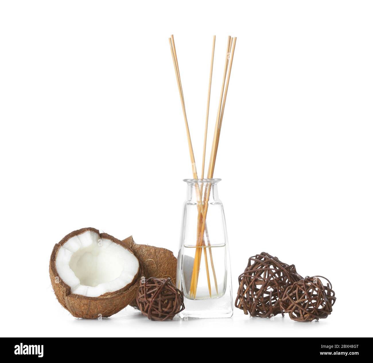 Reed diffuser and coconut on white background Stock Photo Alamy